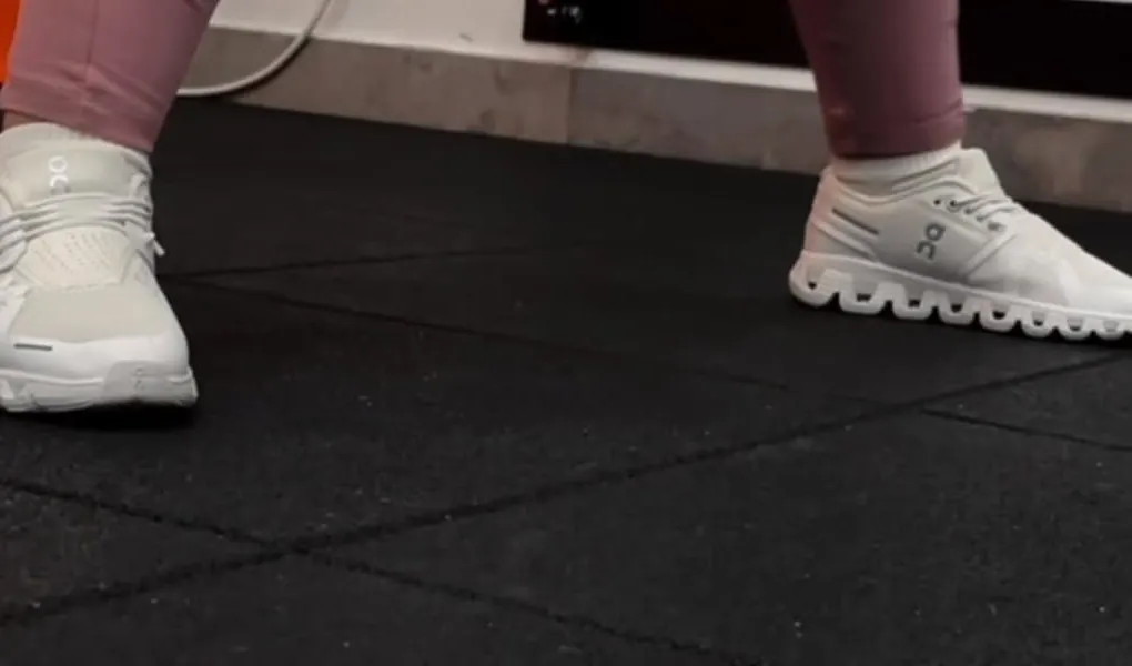 Trainers on the black rubber training floor at Magnetic Gym